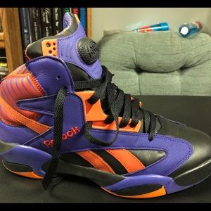 Black and orange Reebok Shaq attack